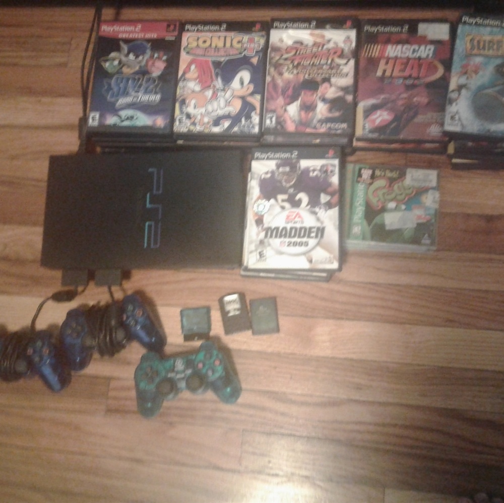 Ps2 with 39 games and 3 remotes.